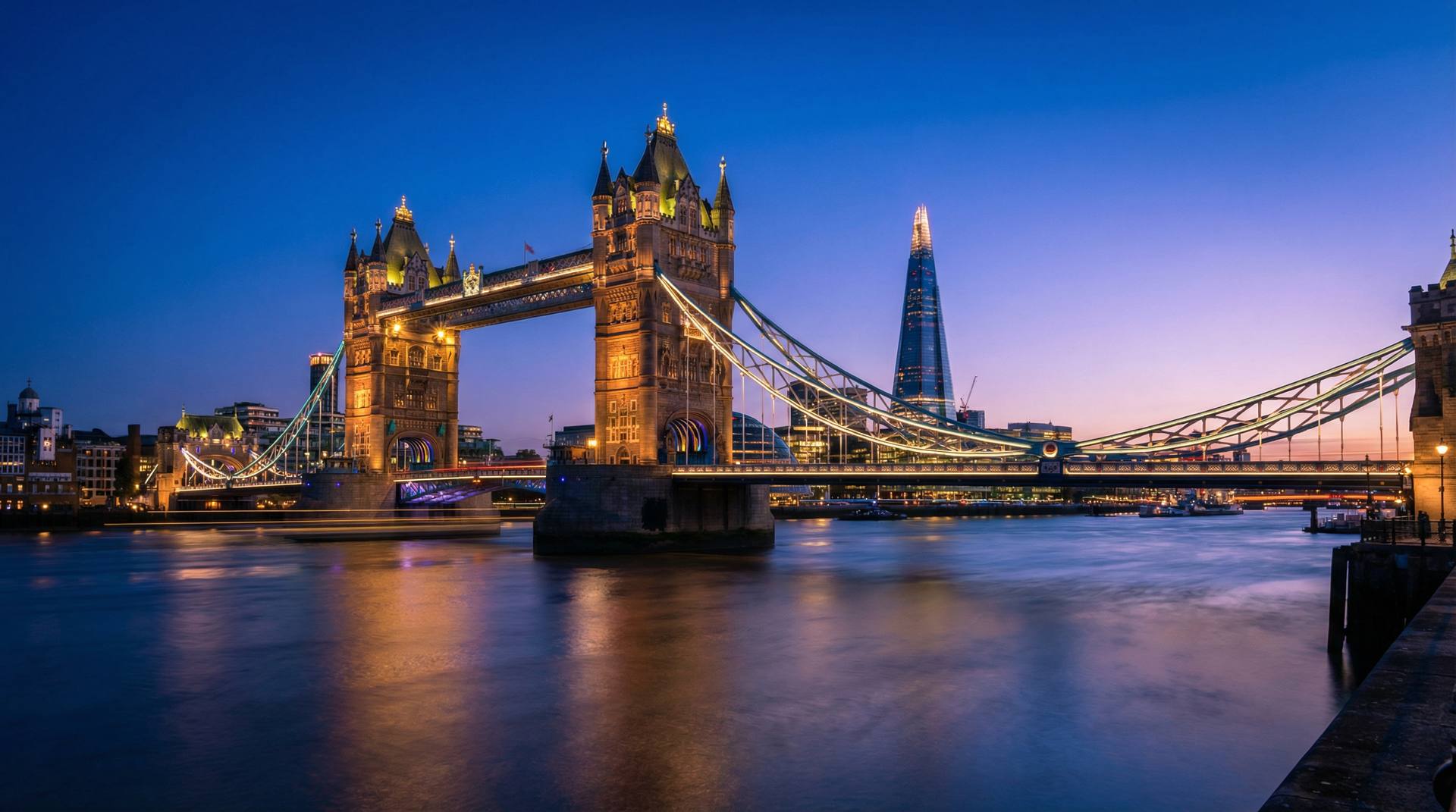London skyline at blue hour with Tower Bridge illuminated